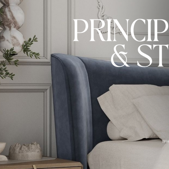 Quiet luxury interior design bedroom featuring a dark blue upholstered bed, neutral linen bedding, classical wall molding, and natural bedside decor.
